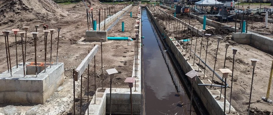 Car wash construction site in Port Orange, FL, with water.