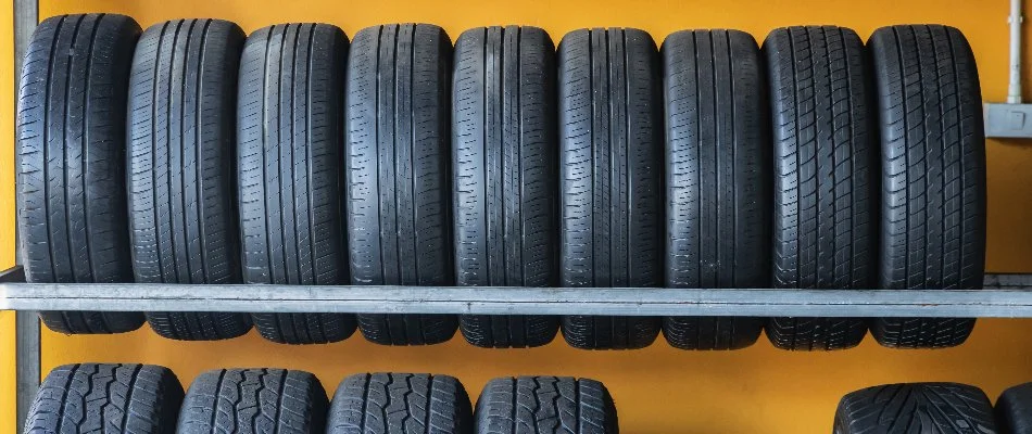Car wheels on display at an auto parts store in Florida.