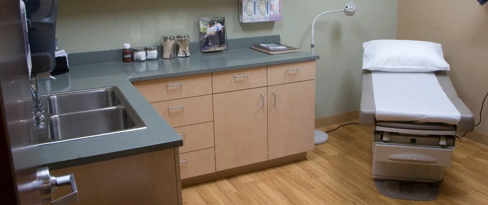 Exam bed and sink in a medical office in El Paso, TX.