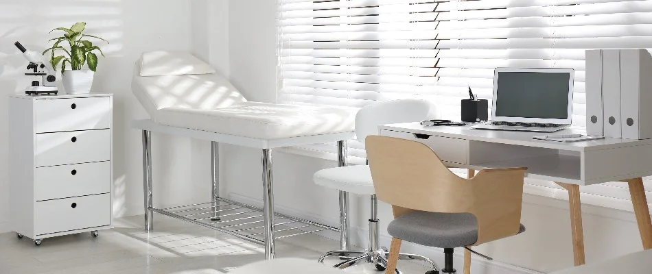 Medical office in Florida with white furniture.
