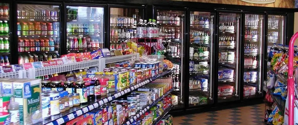 Shelves and coolers of a convenience store in Austin, TX.